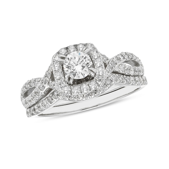 Previously Owned - 1 CT. T.w. Diamond Cushion Frame Twist Shank Bridal Set (I/I2)