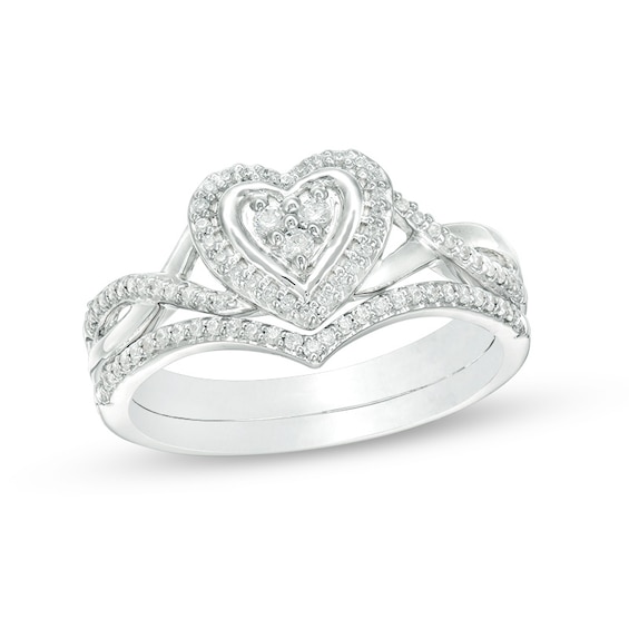 Previously Owned - 1/5 CT. T.w. Diamond Heart Frame Twist Bridal Set in 10K White Gold