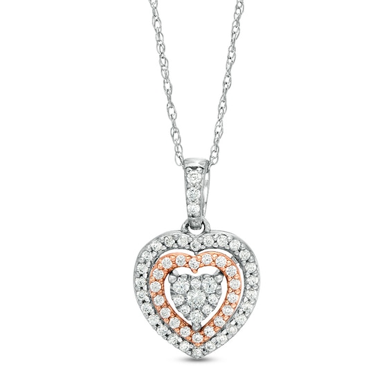 Previously Owned - 1/4 CT. T.w. Diamond Double Frame Heart Pendant in 10K Two-Tone Gold