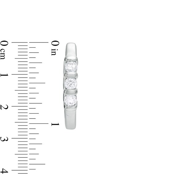 Previously Owned - 1/5 CT. T.w. Diamond Three Stone Hoop Earrings in 10K White Gold