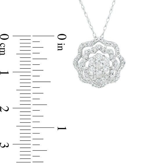 Previously Owned - 1/2 CT. T.w. Diamond Double Frame Flower Pendant in 10K White Gold
