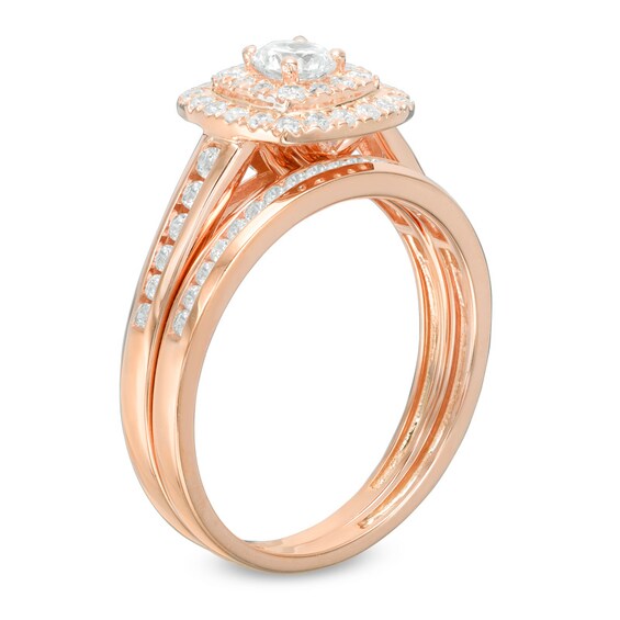 Previously Owned - 3/4 CT. T.w. Diamond Double Cushion Frame Channel Bridal Set in 10K Rose Gold