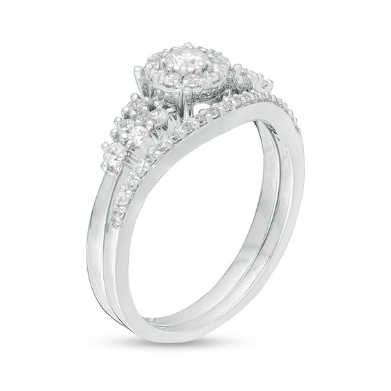 Previously Owned - 1/2 CT. T.w. Diamond Frame Bridal Set in 10K White Gold