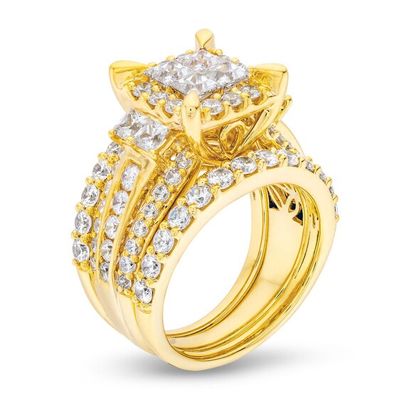 Previously Owned - 4 CT. T.w. Quad Princess-Cut Diamond Frame Tiered Three Piece Bridal Set in 14K Gold