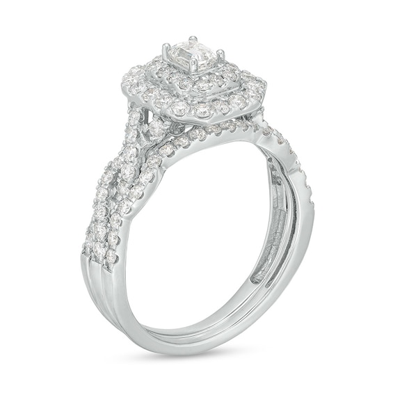 Previously Owned - 1 CT. T.w. Emerald-Cut Diamond Double Frame Twist Shank Bridal Set in 14K White Gold (I/Si2)