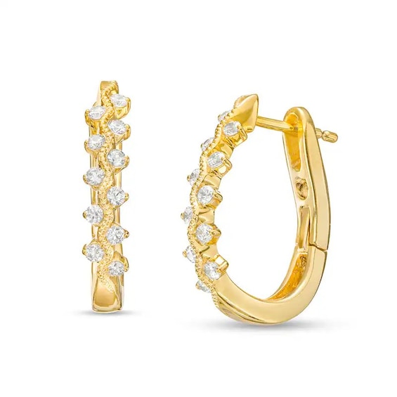Previously Owned - 1/4 CT. T.w. Diamond Zig-Zag Hoop Earrings in 10K Gold