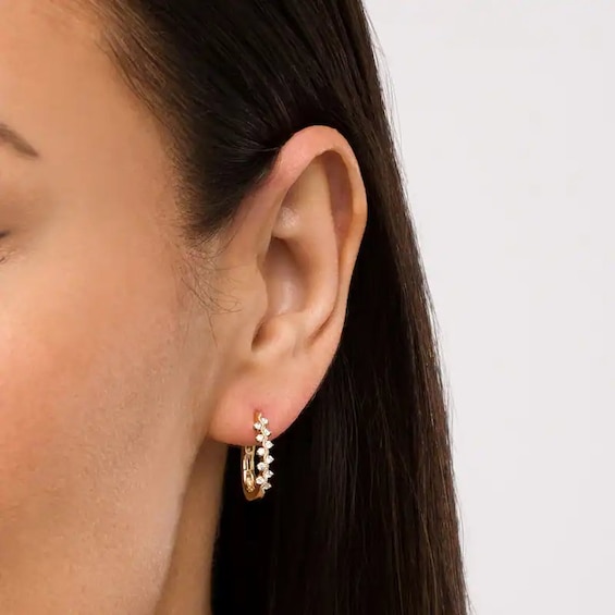 Previously Owned - 1/4 CT. T.w. Diamond Zig-Zag Hoop Earrings in 10K Gold