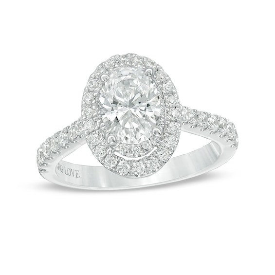 Previously Owned - Vera Wang Love Collection 1-5/8 CT. T.w. Oval Diamond Frame Engagement Ring in Platinum (I/Si2)