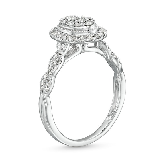 Previously Owned - 1/2 CT. T.w. Oval Multi-Diamond Frame Twist Shank Engagement Ring in 10K White Gold