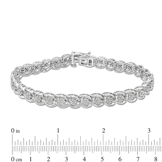 Previously Owned - 1 CT. T.w. Multi-Diamond Cascading Line Bracelet in Sterling Silver - 7.25"
