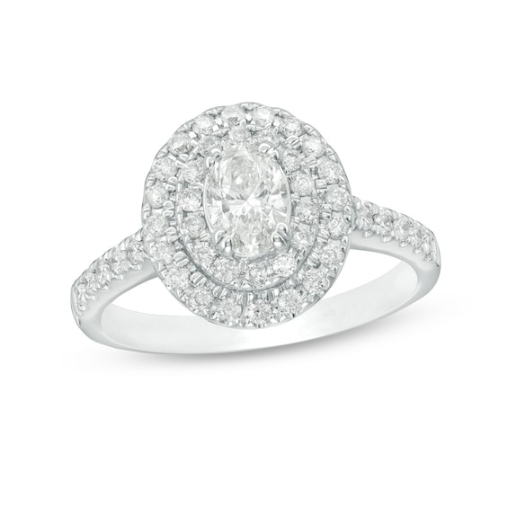 Previously Owned - 1 CT. T.w. Oval Diamond Double Frame Engagement Ring in 14K White Gold