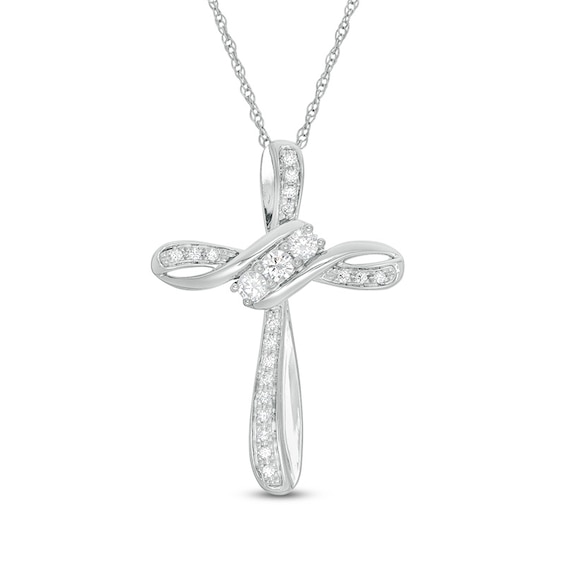 Previously Owned - 1/4 CT. T.w. Diamond Three Stone Bypass Cross Pendant in 10K White Gold