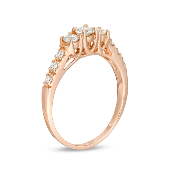Previously Owned - 1/2 CT. T.w. Diamond Three Stone Engagement Ring in 14K Rose Gold (I/I3)
