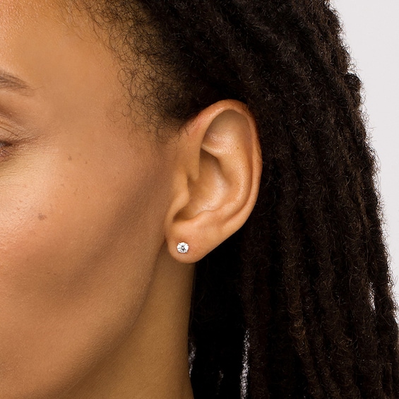 Previously Owned - 1/2 CT. T.w. Diamond Solitaire Stud Earrings in 14K White Gold (I/I1)