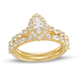 Previously Owned - 1-1/2 CT. T.W. Marquise Diamond Frame Alternating Shank Bridal Set in 14K Gold (I/I1)