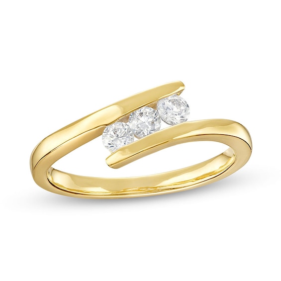Previously Owned - 1/3 CT. T.w. Diamond Slant Three Stone Bypass Ring in 10K Gold