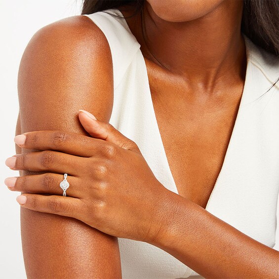 Previously Owned - 1/4 CT. T.w. Diamond Frame Twist Split Shank Promise Ring in 10K White Gold