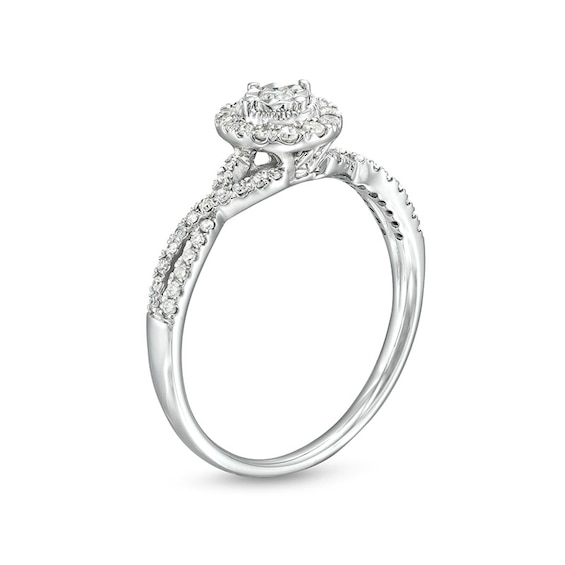 Previously Owned - 1/4 CT. T.w. Diamond Frame Twist Split Shank Promise Ring in 10K White Gold