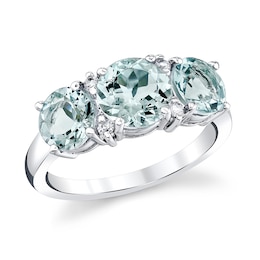 Previously Owned - Aquamarine and 1/20 CT. T.W. Diamond Three Stone Ring in 14K White Gold