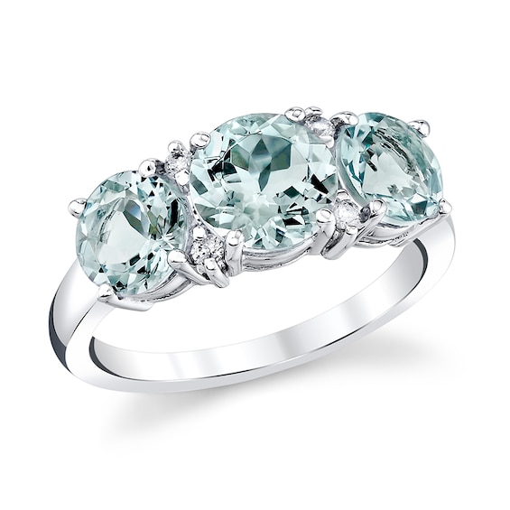 Previously Owned - Aquamarine and 1/20 CT. T.w. Diamond Three Stone Ring in 14K White Gold