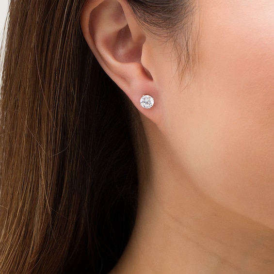 Previously Owned - 1-1/2 CT. T.w. Lab-Grown Diamond Solitaire Stud Earrings in 14K White Gold (F/Si2)