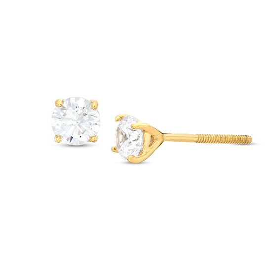 Previously Owned - 3/4 CT. T.w. Pear Multi-Diamond Polished Braid Bridal Set in 10K Gold