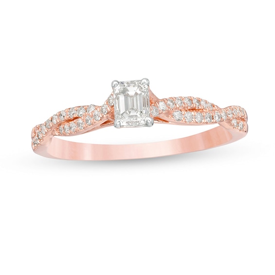 Previously Owned - 1/2 CT. T.w. Emerald-Cut Diamond Twist Shank Engagement Ring in 14K Rose Gold