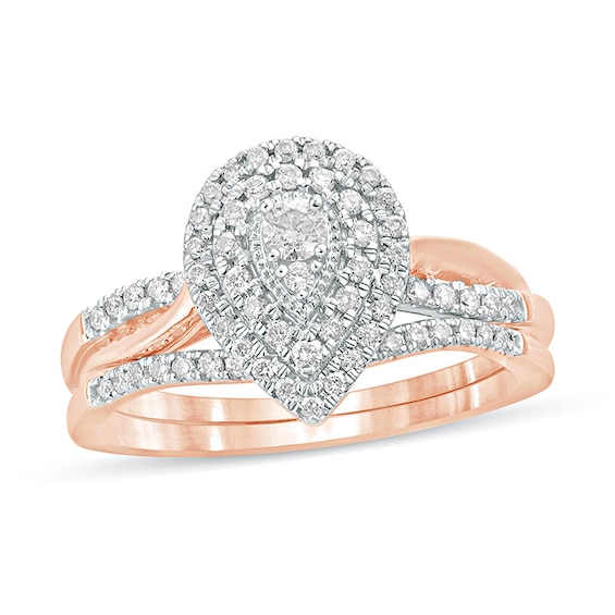 Previously Owned - 3/8 CT. T.w. Composite Diamond Pear-Shaped Double Frame Twist Shank Bridal Set in 10K Rose Gold