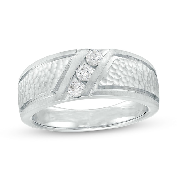 Previously Owned - 1/3 CT. T.w. Diamond Textured Shank Three Stone Wedding Band in 10K White Gold
