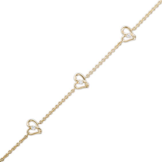 Previously Owned - Two in Love 1/10 CT. T.w. Diamond Tilted Loop Heart Station Bracelet in 10K Gold – 7.5"