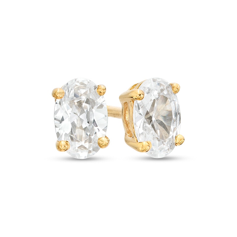 Main Image 1 of Previously Owned - 1/2 CT. T.W. Oval Lab-Grown Diamond Solitaire Stud Earrings in 14K Gold (F/SI2)