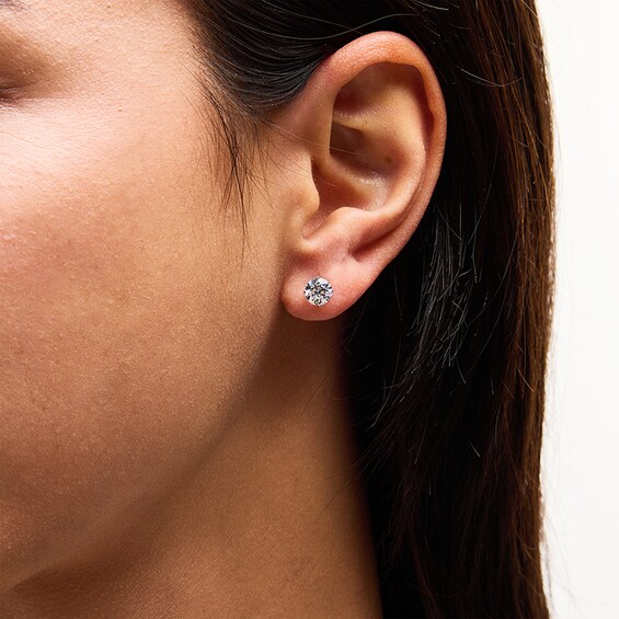 Previously Owned - 1-1/2 CT. T.w. Lab-Grown Diamond Solitaire Stud Earrings in 14K Gold (F/Si2)
