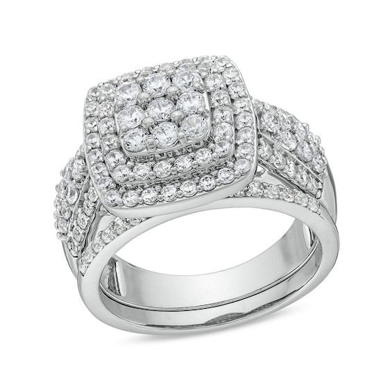 Previously Owned - 1-1/3 CT. T.w. Cushion Multi-Diamond Bow-Tie Bridal Set in 10K White Gold