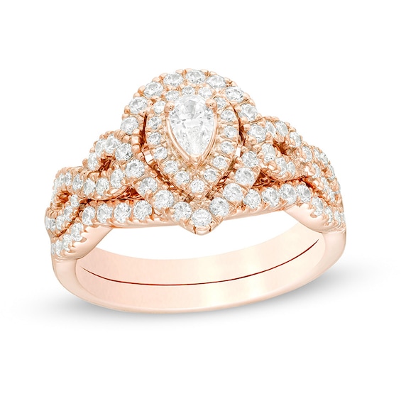 Previously Owned - 1 CT. T.w. Pear-Shaped Diamond Double Frame Twist Shank Bridal Set in 14K Rose Gold