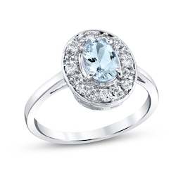 Previously Owned - Oval Aquamarine and 1/5 CT. T.W. Diamond Frame Ring in 14K White Gold