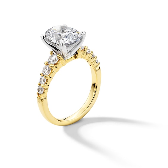 Previously Owned - 3-3/4 CT. T.w. Oval Lab-Grown Diamond Graduated Shank Engagement Ring in 14K Gold (I/Si2)
