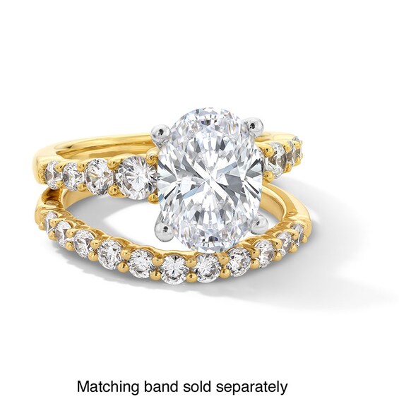 Previously Owned - 3-3/4 CT. T.w. Oval Lab-Grown Diamond Graduated Shank Engagement Ring in 14K Gold (I/Si2)