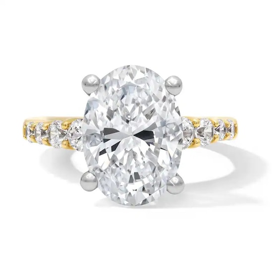 Previously Owned - 5-3/4 CT. T.w. Oval Lab-Grown Diamond Graduated Shank Engagement Ring in 14K Gold