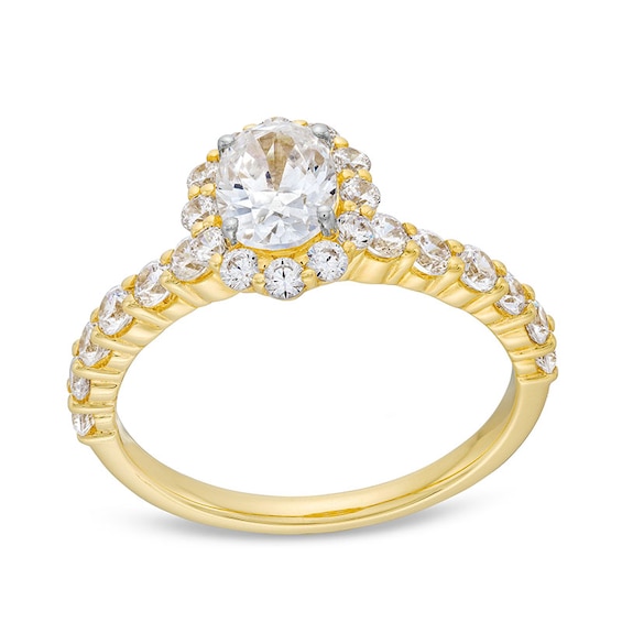 Previously Owned - 1-1/2 CT. T.w. Oval Diamond Frame Engagement Ring in 14K Gold (I/Si2)