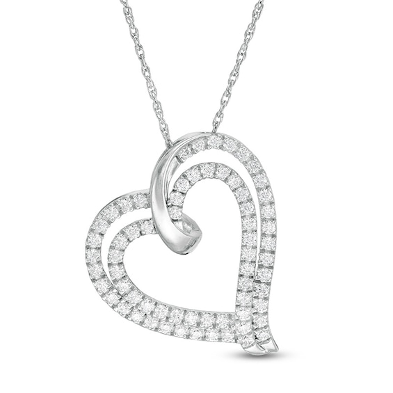 Previously Owned - 1/2 CT. T.w. Diamond Double Tilted Heart Pendant in 10K White Gold