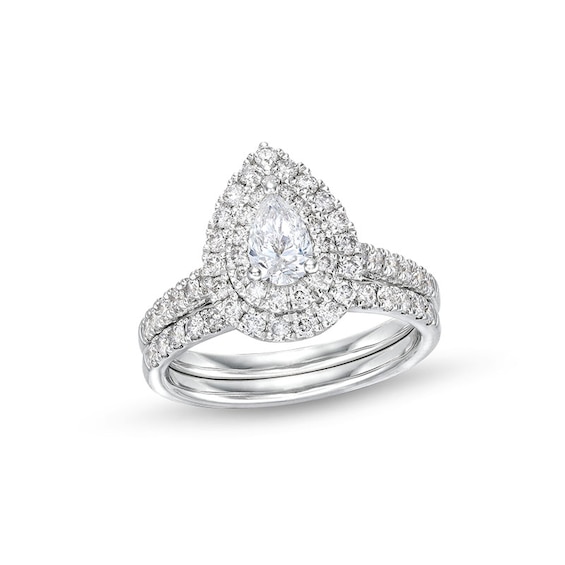 Previously Owned - 1-1/2 CT. T.w. Pear-Shaped Diamond Frame Bridal Set in 14K White Gold (I/I1)