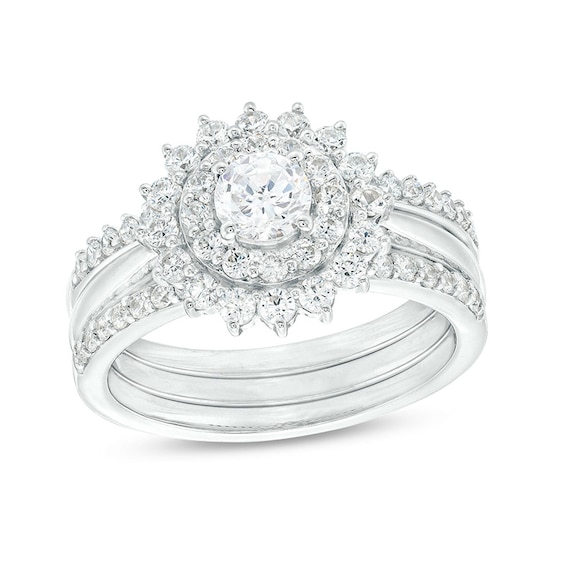 Previously Owned - 1-1/6 CT. T.w. Diamond Double Flower Frame Three Piece Bridal Set in 10K White Gold (J/I3)
