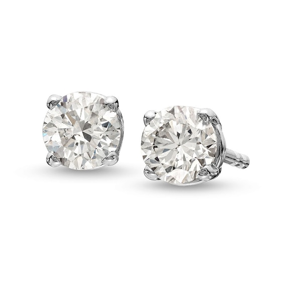 Previously Owned - 1/2 CT. T.w. Diamond Solitaire Stud Earrings in 10K White Gold (J/I3)