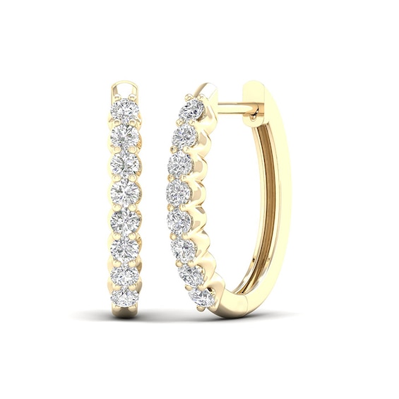 Previously Owned - 1/2 CT. T.w. Diamond Oval Hoop Earrings in 10K Gold