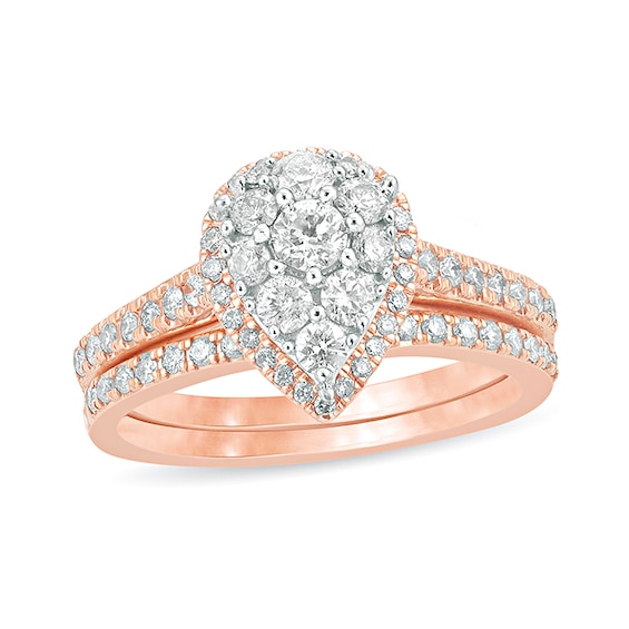 Previously Owned - 1 CT. T.w. Composite Pear Diamond Frame Bridal Set in 10K Rose Gold