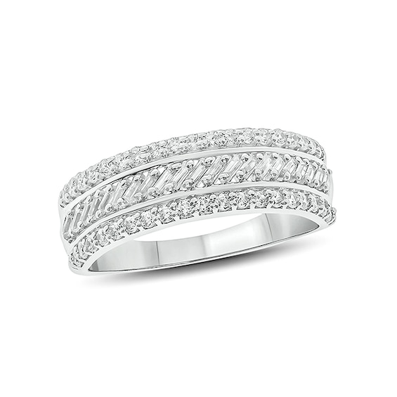 Previously Owned - 1/2 CT. T.w. Baguette and Round Diamond Slant Stripe Anniversary Band in 10K White Gold