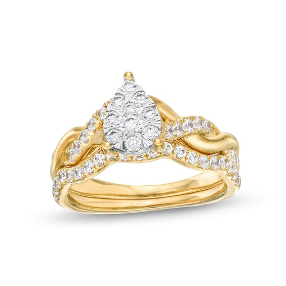 Previously Owned - 3/4 CT. T.w. Pear Multi-Diamond Polished Braid Bridal Set in 10K Gold
