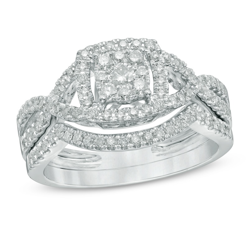 Main Image 1 of Previously Owned - 5/8 CT. T.W. Composite Diamond Frame Twist Shank Bridal Set in 10K White Gold