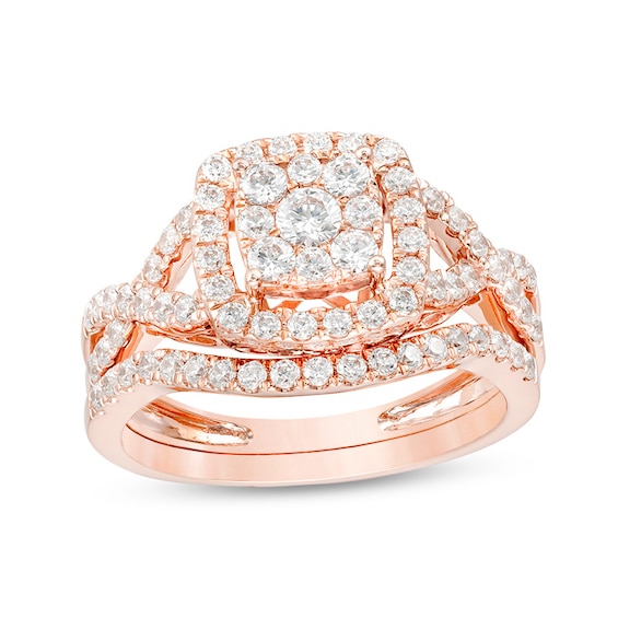 Previously Owned - 1 CT. T.w. Diamond Double Cushion Frame Twist Bridal Set in 10K Rose Gold