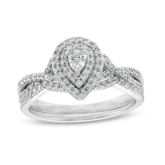 Previously Owned - 5/8 CT. T.w. Pear-Shaped Diamond Double Frame Twist Shank Soldered Bridal Set in 10K White Gold
